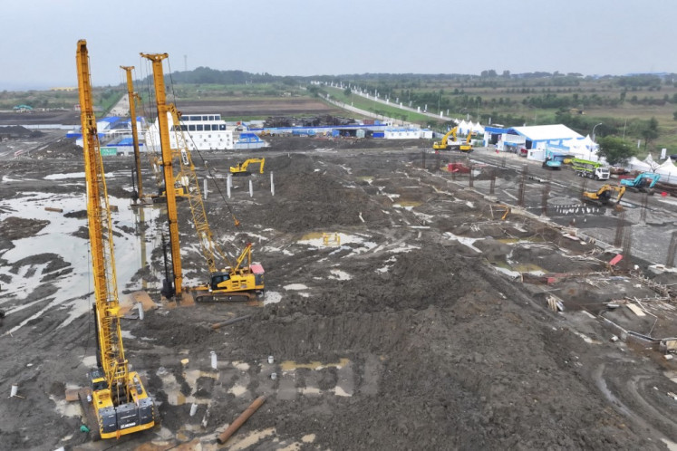 Construction proceeds on June 29 at the prospective site of Southeast Asia's largest battery industry project, inaugurated by President Prabowo Subianto, in Karawang, West Java.
