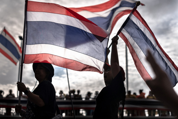 Anti-government protesters rally to demand the removal of Thailand's Prime Minister Paetongtarn Shinawatra from office at Victory Monument in Bangkok on June 28, 2025.