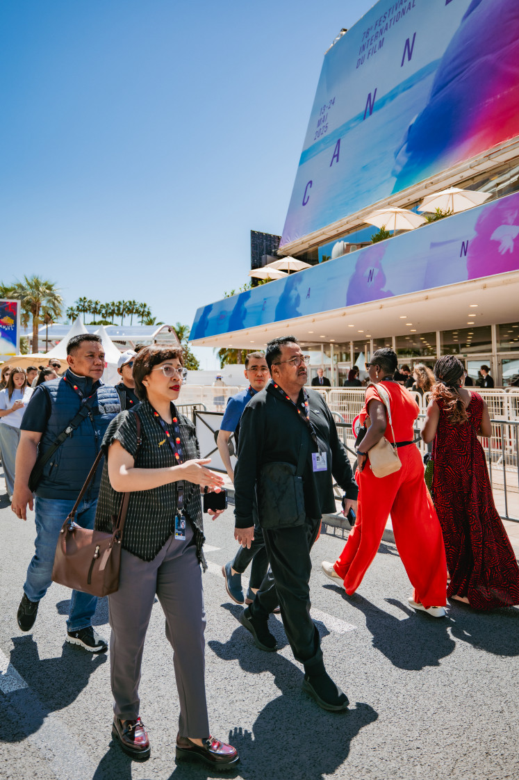 Rina Damayanti, festival director of Jakarta Film Week, walks alongside Jakarta Vice Governor Rano Karno at this year’s Cannes Film Festival in mid-May.
