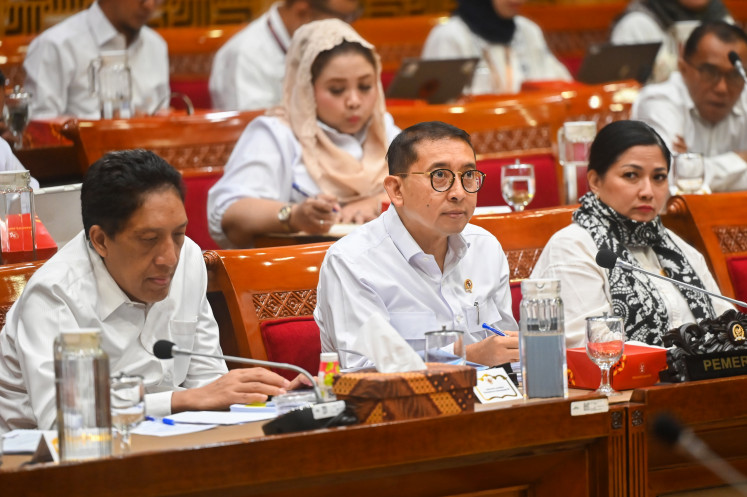 Culture Minister Fadli Zon (center) listens to questions from lawmakers during a meeting with House of Representatives Commission X on July 2, 2025, at the Senayan legislative complex in Jakarta.