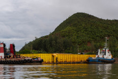 PT Gag Nikel’s barge and tug boats have been moored for weeks at the company’s port at Gag island, Raja Ampat, West Papua, on June 19, 2025. 
