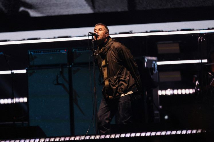 Liam Gallagher of Oasis performs during the first of their sellout comeback shows at the Cardiff Principality Stadium, in Cardiff, Wales, Britain, on July 4, 2025.