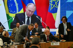 Putin says liberal globalization is obsolete