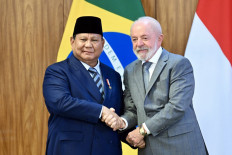 President Prabowo Subianto (left) and Brazil's President Luiz Inacio Lula da Silva shake hands after a press statement at Planalto Palace in Brasilia, on July 9, 2025