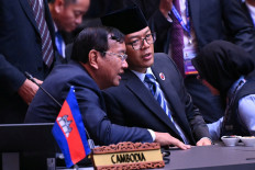 Foreign Minister Sugiono speaks to Cambodia's Foreign Minister Prak Sokhonn as they attend the 15th East Asia Summit Foreign Ministers' Meeting during the 58th ASEAN Foreign Ministers' Meeting and related meetings at the Convention Centre in Kuala Lumpur on July 11, 2025. 