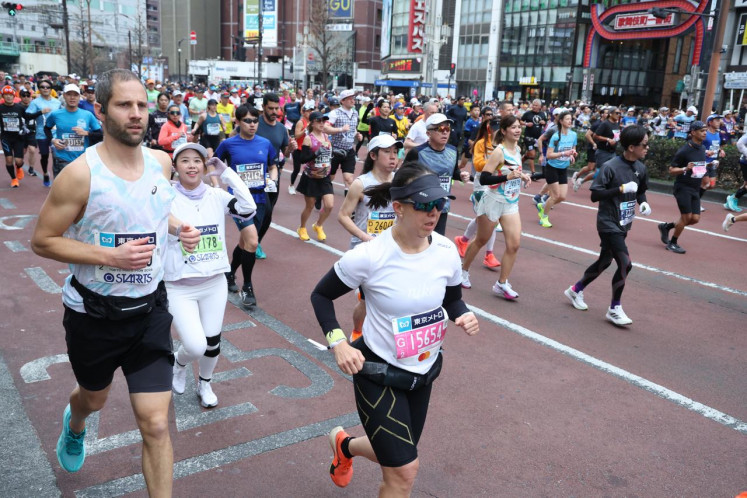 Erika Dianasari at the Tokyo Marathon in 2025, where the weather is cooler and the roads are safer.