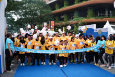In celebration of National Children’s Day 2025, a charity run by Plan Indonesia and the National Commission on Disabilities encourages families to move, physically and socially. (Courtesy of Run for Equality)