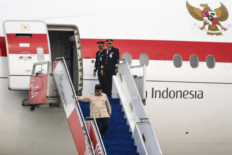 Home at last: President Prabowo Subianto disembarks from the presidential plane upon arrival on July 16 at Halim Perdanakusuma Air Force Base in Jakarta, after a two-week tour to six countries, from Saudi Arabia to France.