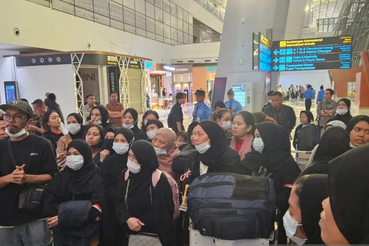 Home sweet home: Migrant workers arrive at Soekarno-Hatta International Airport, Tangerang, Banten, in the early hours of Jan. 12, 2025, following their deportation from Saudi Arabia for violating immigration procedures.