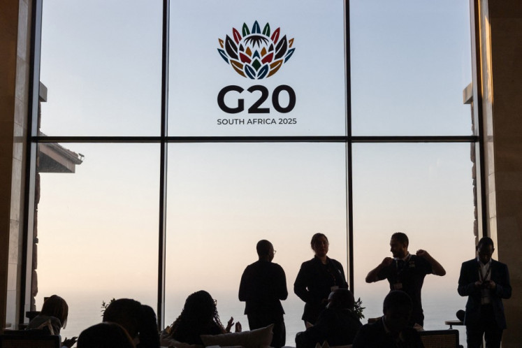 Delegates arrive ahead of the G20 Finance and Central Bank Deputies and Finance Ministers and Central Bank Governors Meetings, at the Capital hotel in Zimbali, Durban on July 17, 2025. 
