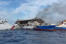This screen grab taken from video released by the National Search and Rescue Agency (Basarnas) and the Maritime Security Agency (Bakamla) on July 20, 2025 shows the KM Barcelona 5 ferry after a fire broke out while on its way to Manado, North Sulawesi. 