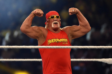 Wrestling legend Hulk Hogan greets the crowd during the World Wrestling Entertainment (WWE) Crown Jewel pay-per-view at the King Saud University Stadium in Riyadh on November 2, 2018.