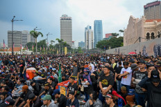 Protesters gather near Merdeka Square during a protest against Malaysia's Prime Minister Anwar Ibrahim in Kuala Lumpur on July 26, 2025. Several thousand Malaysians took to the capital's streets to protest growing public discontent over rising living costs and a perceived lack of reform by Prime Minister Anwar Ibrahim's unity government.