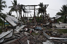 An evacuated house that was destroyed by fire after being hit by Cambodian artillery that morning, is seen in the Thai border province of Surin on July 27, 2025. 