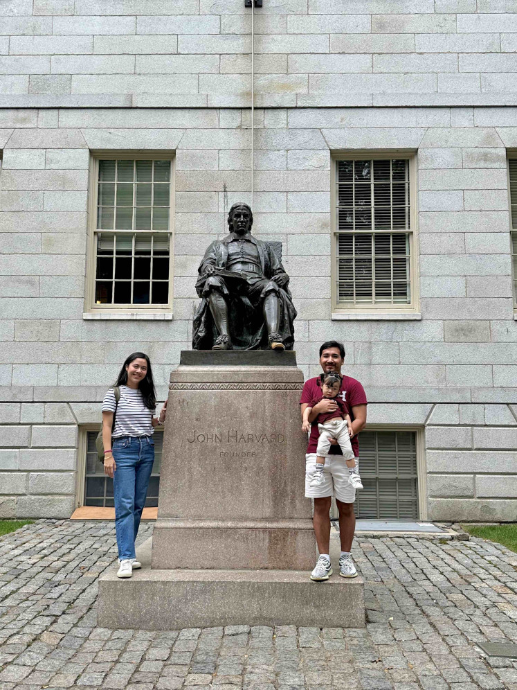 While on a J‑1 visa in Massachusetts, Celline lived with her husband and daughter, who were registered as her dependents.