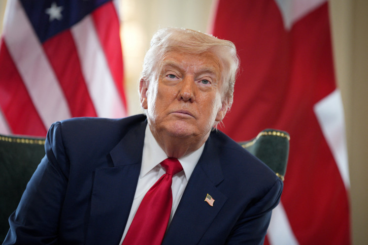 US President Donald Trump looks on during a meeting with British Prime Minister Keir Starmer (not pictured) at Trump Turnberry golf club on July 28, 2025 in Turnberry, Scotland, Britain.
