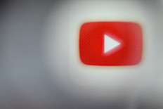 This illustration photograph taken on December 22, 2023, shows the logo of video sharing portal YouTube displayed on a smartphone screen, in Frankfurt am Main, western Germany.

