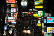A nighttime view of Soi Thaniya in Patpong entertainment district, known locally as Little Tokyo, is seen on Aug 17, 2013, in Bangkok. 