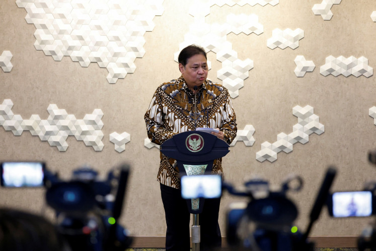 Coordinating Economy Minister Airlangga Hartarto addresses a press conference in Jakarta on July 24, 2025.