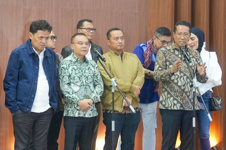 Law Minister Supratman Andi Agtas (second right) delivers a press statement alongside Deputy House of Representatives Speaker Sufmi Dasco Ahmad (second left), State Secretary Prasetyo Hadi (fourth right) and House Commission III chair Habiburokhman (left) at the legislative complex in Senayan, Jakarta, on July 31, 2025. The House has approved President Prabowo Subianto’s request to grant abolition to Thomas Trikasih Lembong and amnesty to Hasto Kristiyanto.