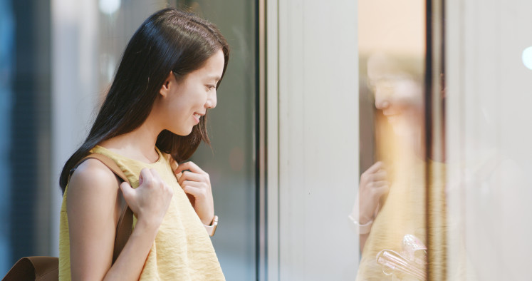 Stock illustration of window shopping.