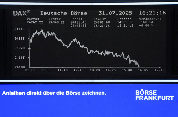A chart for German share price index DAX is displayed at the stock exchange in Frankfurt, Germany, on July 31, 2025.
