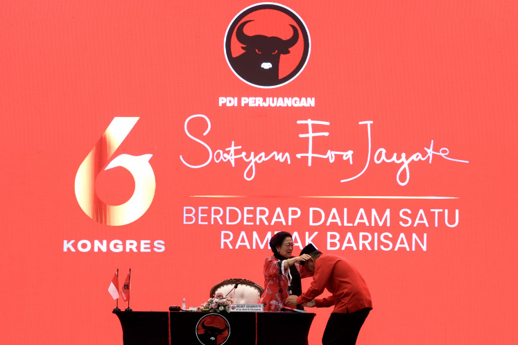 'Ideological party': Indonesian Democratic Party of Struggle (PDI-P) chairwoman Megawati Soekarnoputri welcomes secretary-general Hasto Kristiyanto on Saturday before the closing session of the party's congress in Nusa Dua, Bali. Just days before his appearance in the congress, Hasto, who was convicted of bribery on July 25, received amnesty from President Prabowo Subianto.
