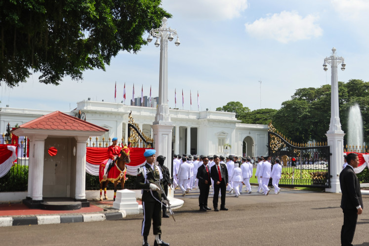 A number of Regional Heads undergo a march on Feb. 19 at the Merdeka Palace in Jakarta.