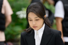 South Korea's former first lady Kim Keon Hee, wife of impeached former president Yoon Suk Yeol, arrives at the special prosecutor's office in Seoul on August 6, 2025. South Korea's former first lady Kim Keon Hee appeared for questioning by prosecutors on August 6 over a litany of allegations, including stock manipulation and bribery. 