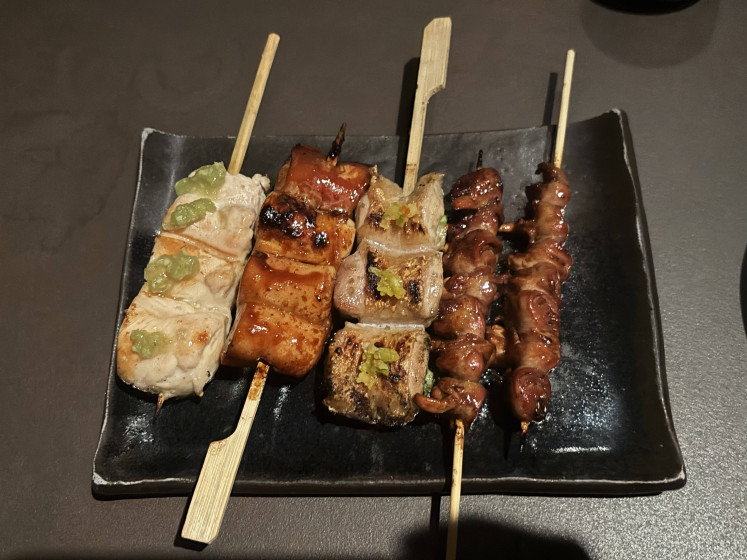 The yakitori quartet unfolds like a setlist, from wasabi-laced tenderloin to the bold chew of upper heart.
