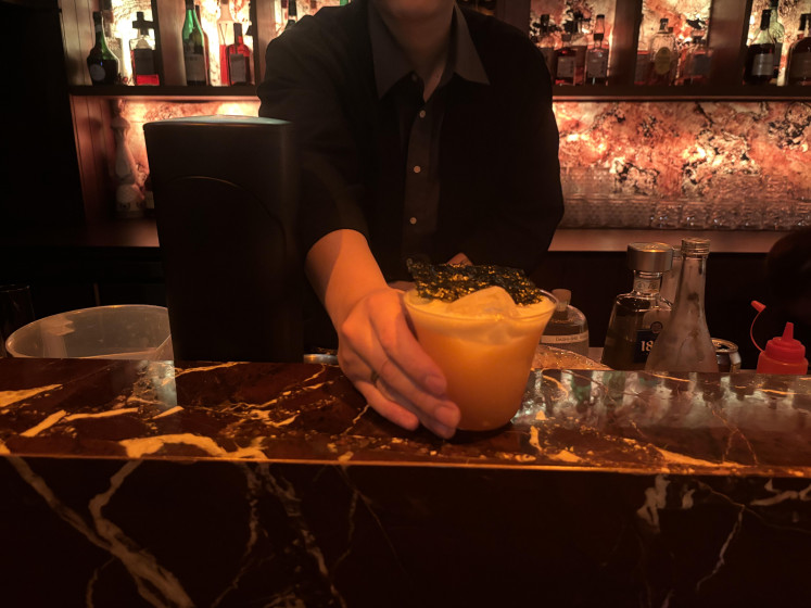 One of four cocktails on offer that night, Umi No Ume balances savory and sweet with dashi-shu tequila, Aperol, yuzu and seaweed.