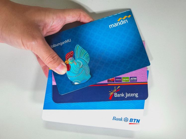 An illustration of savings book issued by several Indonesian banks.