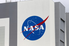 The NASA logo is seen at Kennedy Space Center ahead of the NASA/SpaceX launch of a commercial crew mission to the International Space Station (ISS) in Cape Canaveral, Florida, the United States, on April 16, 2021.