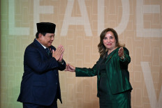 Peru's President Dina Boluarte (right) welcomes President Prabowo Subianto on Nov. 16, 2024, upon his arrival at the APEC Economic Leaders' Meeting (AELM) at the Convention Centre in Lima.