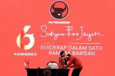 'Ideological party': Indonesian Democratic Party of Struggle (PDI-P) chairwoman Megawati Soekarnoputri welcomes secretary-general Hasto Kristiyanto on Saturday before the closing session of the party's congress in Nusa Dua, Bali. Just days before his appearance in the congress, Hasto, who was convicted of bribery on July 25, received amnesty from President Prabowo Subianto. 