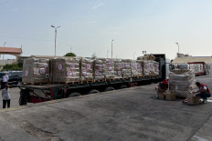 Humanitarian aid waits to be delivered to Gaza, at a logistics site run by the Egyptian Red Crescent outside Arish, Egypt on August 11, 2025.