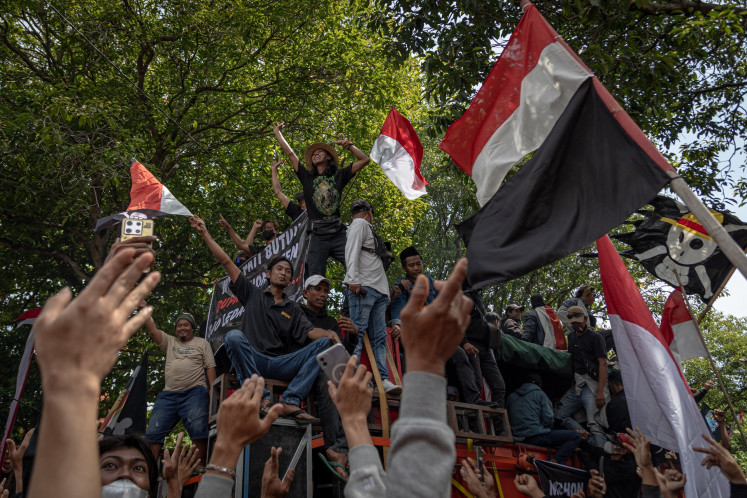 Critical voices: Members of grassroots groups stage a protest on Wednesday outside Pati Regent Sudewo's office in Central Java. Protestors called for Sudewo's immediate resignation amid a wave of controversy sparked by his widely criticized policies.