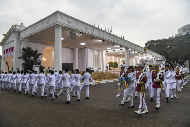 National flag bearers (Paskibraka) march during the rehearsal for the coming Independence Day ceremony at the State Palace in Jakarta on Aug. 14, 2025. Indonesia will celebrate its 80th Independence Day on Aug. 17.