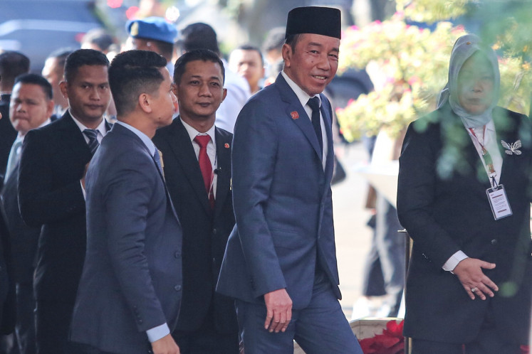 Former president Joko "Jokowi" Widodo arrives at the Senayan Legislative Complex in Central Jakarta on Aug. 15, 2025 to attend President Prabowo Subianto's first State of the Nation address.