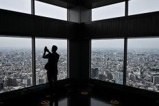 Japan posts modest growth despite US tariffs