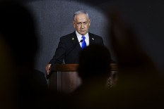 Israeli Prime Minister Benjamin Netanyahu delivers a statement during the US Independence Day reception, known as the annual “Fourth of July“ celebration, hosted by Newsmax in Jerusalem on Aug. 13, 2025. 