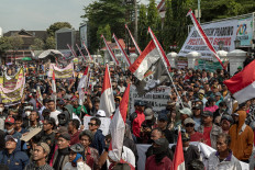 Grassroots groups stage a rally on Aug. 13, 2025 outside Pati Regent Sudewo's office in Central Java, demanding his resignation. 