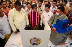 Members of Myanmar's Union Election Commission (UEC) speak during a demonstration of voting machines to be used in future elections in Yangon on September 5, 2023. Myanmar's ruling military junta said on August 18, 2025 that the country's election will start on December 28, beginning a phased poll being boycotted by opposition groups and criticized by international monitors.