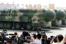Military vehicles carrying DF-41 intercontinental ballistic missiles drive past Tiananmen Square during the military parade marking the 70th founding anniversary of People's Republic of China, on its National Day in Beijing, China October 1, 2019.