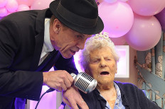 A handout photograph released by Hallmark Care Homes and taken on August 21, 2024, shows Ethel Caterham celebrating her 115th birthday in Lightwater, south west of London. 
