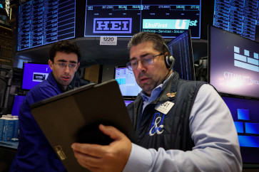 Traders work on the floor at the New York Stock Exchange (NYSE) in New York City, US, on Aug. 21, 2025. (Reuters/Brendan McDermid).
Usage: 0