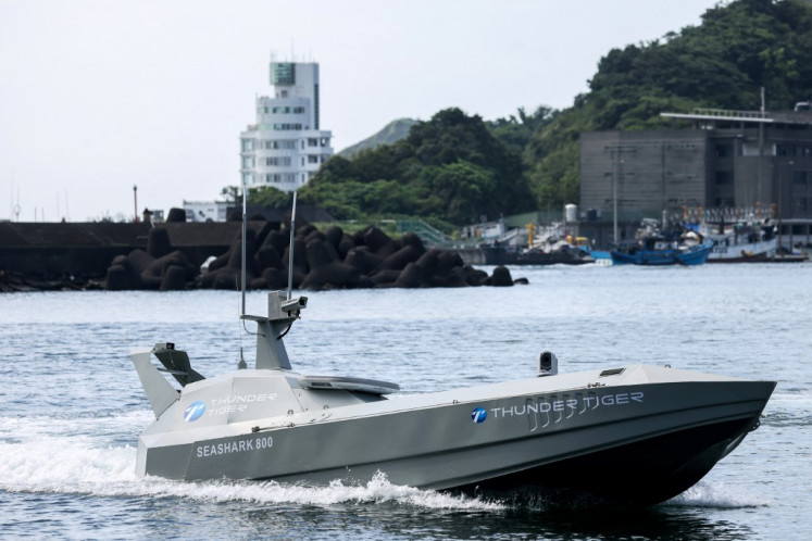 The SeaShark 800 sea drone, developed by Thunder Tiger company, demonstrates its capabilities on June 17 during an event held by the National Chung-Shan Institute of Science and Technology (NCSIST), at Suao Harbour, in Yilan, Taiwan.
