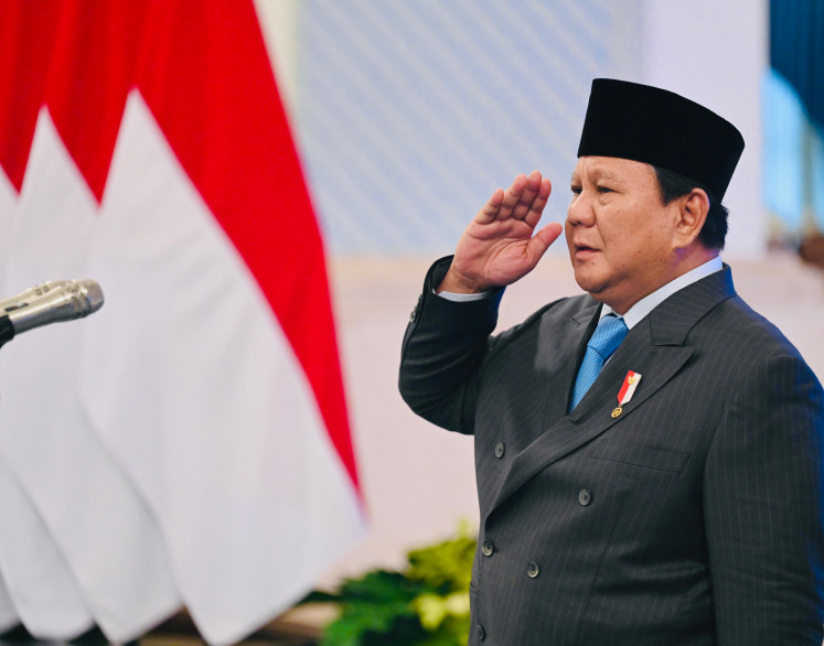President Prabowo Subianto gestures during a ceremony for the bestowing of civilian honors at the State Palace in Jakarta on August 25, 2025.

