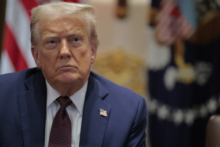 US President Donald Trump attends a cabinet meeting with members of his administration in the Cabinet Room of the White House on August 26, 2025 in Washington, DC. This is the seventh cabinet meeting of Trump's second term. 