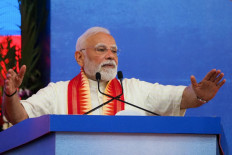 India's Prime Minister Narendra Modi addresses a public meeting in Ahmedabad, India, on Aug. 25, 2025.